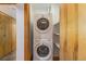 Stackable washer and dryer in a utility closet at 1020 15Th St # 202, Denver, CO 80202