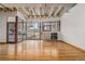 Spacious living room with hardwood floors and city views at 1020 15Th St # 202, Denver, CO 80202