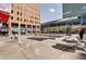 Urban plaza with seating, restaurants, and modern architecture at 1020 15Th St # 202, Denver, CO 80202