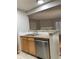 Kitchen with double sink and dishwasher at 14602 E 2Nd Ave # 109C, Aurora, CO 80011