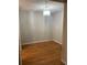 Bright dining room features hardwood floors and a modern chandelier at 14602 E 2Nd Ave # 109C, Aurora, CO 80011
