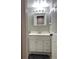 Clean bathroom with vanity, sink, and mirror at 14602 E 2Nd Ave # 109C, Aurora, CO 80011