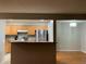 Kitchen with wood cabinets and stainless steel appliances at 14602 E 2Nd Ave # 109C, Aurora, CO 80011