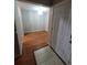 Spacious entryway with hardwood floors and access to dining room at 14602 E 2Nd Ave # 109C, Aurora, CO 80011