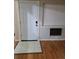Light and airy entryway with tile flooring and modern door at 14602 E 2Nd Ave # 109C, Aurora, CO 80011