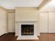 Living room with a classic white fireplace at 6705 S Field St # 803, Littleton, CO 80128
