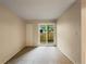 Bedroom with patio access and carpet flooring at 6705 S Field St # 803, Littleton, CO 80128