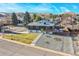 Aerial view of the house and neighborhood, showing surrounding landscape at 637 S Cole Ct, Lakewood, CO 80228