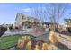 Landscaped backyard with pathway and grass at 7899 S Country Club Pkwy, Aurora, CO 80016