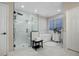 Spa-like bathroom with a large soaking tub and walk-in shower at 22385 E Arbor Pl, Aurora, CO 80016