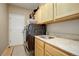 Laundry room with washer, dryer, and utility sink at 22385 E Arbor Pl, Aurora, CO 80016