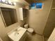 Basement bathroom with toilet and sink at 190 Hemlock St, Broomfield, CO 80020