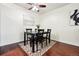 Dining area with a four-person table and chairs at 10211 Ura Ln # 8-207, Thornton, CO 80260