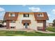 Condo building exterior view showing a well maintained property at 10211 Ura Ln # 8-207, Thornton, CO 80260