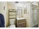 Clean bathroom with vanity, toilet, and shower at 10211 Ura Ln # 8-207, Thornton, CO 80260