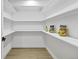 Bright walk-in pantry with ample shelving at 870 S Eaton St, Lakewood, CO 80226