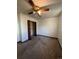 Bedroom with ceiling fan, double door closet and carpet at 900 S Nile Way, Aurora, CO 80012