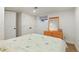 Basement bedroom with full bed and double closets at 5410 Columbine Rd, Denver, CO 80221