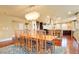 Dining room with hardwood floors and a view of the kitchen at 5410 Columbine Rd, Denver, CO 80221