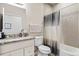 Clean bathroom with granite vanity, shower/tub combo, and updated fixtures at 875 E 78Th Ave # 40, Denver, CO 80229