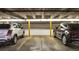 Underground parking garage with designated spaces at 4570 E Yale Ave # 702, Denver, CO 80222