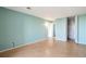 Simple bedroom with light walls and wood flooring at 4570 E Yale Ave # 702, Denver, CO 80222