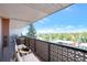 Relaxing balcony with city views and seating area at 4570 E Yale Ave # 702, Denver, CO 80222