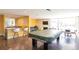 Community room with a pool table and seating at 4570 E Yale Ave # 702, Denver, CO 80222