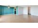 Spacious living room featuring hardwood floors and a view into the kitchen at 4570 E Yale Ave # 702, Denver, CO 80222