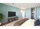 Bright bedroom with built-in closet and access to bathroom at 4570 E Yale Ave # 702, Denver, CO 80222
