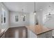 Bright dining area adjacent to the kitchen with hardwood floors at 12712 E Caspian Pl, Aurora, CO 80014