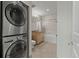 Bathroom with stackable washer and dryer at 25 N Downing St # 2-304, Denver, CO 80218