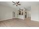 Living room with hardwood floors and an open concept kitchen at 25 N Downing St # 2-304, Denver, CO 80218