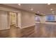 Spacious basement with wood-look floors and large windows at 6885 W 68Th Ave, Arvada, CO 80003