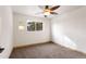 Bedroom with ceiling fan and carpeted floors at 18810 Cloven Hoof Rd, Palmer Lake, CO 80133