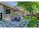 Landscaped backyard with patio, providing a private outdoor space at 114 E 14Th Ct, Broomfield, CO 80020