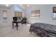 Spacious bedroom with large windows, desk, and plenty of natural light at 114 E 14Th Ct, Broomfield, CO 80020