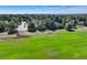 Aerial view of house and surrounding golf course at 114 E 14Th Ct, Broomfield, CO 80020