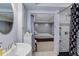 Basement bathroom with walk-in shower and updated fixtures at 114 E 14Th Ct, Broomfield, CO 80020