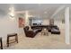 Finished basement with large sectional sofa and ample space for entertainment at 114 E 14Th Ct, Broomfield, CO 80020