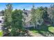 Elevated view of home's backyard, showcasing landscaping and trees at 114 E 14Th Ct, Broomfield, CO 80020