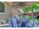 Charming backyard patio with a table and chairs, ideal for outdoor relaxation at 114 E 14Th Ct, Broomfield, CO 80020