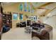 Bright and airy living room with vaulted ceilings and large windows at 114 E 14Th Ct, Broomfield, CO 80020