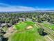Aerial view of a neighborhood near a golf course at 114 E 14Th Ct, Broomfield, CO 80020