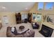 Vaulted ceilings and large windows make this living room bright and airy at 114 E 14Th Ct, Broomfield, CO 80020