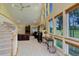 Living area with a staircase, fireplace, and lots of natural light at 114 E 14Th Ct, Broomfield, CO 80020