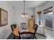 Bright dining area features an oval table and bay window at 114 E 14Th Ct, Broomfield, CO 80020