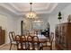 Formal dining room with hardwood floors and a chandelier at 114 E 14Th Ct, Broomfield, CO 80020