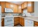 Efficient kitchen with ample cabinetry and appliances at 9385 E Center Ave # 1D, Denver, CO 80247