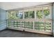 Sunroom with wall-to-wall windows providing abundant natural light at 9385 E Center Ave # 1D, Denver, CO 80247